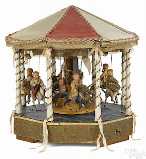 Large electric carousel music box display with nine dressed celluloid children