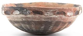 An Earthenware Bowl, Height 11 inches.
