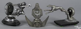 Three automobile mascot hood ornaments, to include a Boyce Motometers on a winged base