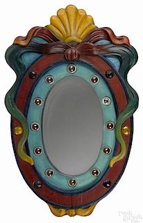 Carousel rounding board shield, painted carved wood with jewel decoration and electric lighting