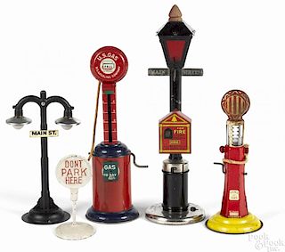 Street lamps and gas pumps, to include a Mohawk Toys tin lithograph visible gas pump, 8'' h.