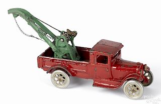 Arcade cast iron Weaver tow truck with a nickel-plated driver, 11'' l.