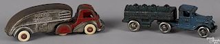 Two cast iron tractor trailers, to include an A. C. Williams Gasoline - Motor Oil truck, 7'' l.