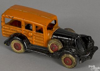 A. C. Williams cast iron take-a-part station wagon with side mount spare tires, 5'' l.