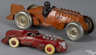 Two Hubley cast iron race cars, one having operating pistons with flames, 10 1/4'' l.