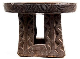 An African Carved Hardwood Stool, Width 18 1/2 inches.