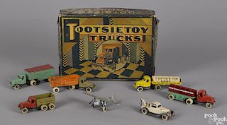 Toostsietoy Deluxe Trucks set, in its original box, to include an airplane, a dairy tanker truck