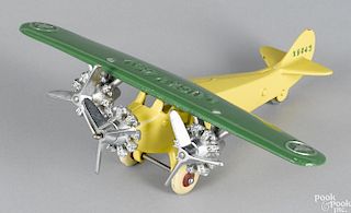 Dent cast iron Lucky Boy tri-motor airplane with rubber tires, wingspan - 12 1/4''.