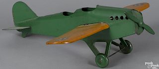 Steelcraft pressed steel open cockpit airplane, modeled after the Lockheed Siruis, wingspan - 17''.