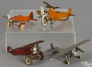 Three cast iron Hubley airplanes, to include a Giro Plane with a nickeled engine and propellers