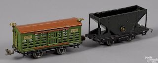 Two Lionel O Gauge freight train cars, to include a no. 806 reversed color cattle car