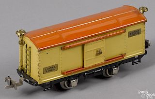 Lionel O Gauge no. 805 train box car, having a scarce yellow with orange roof variation, 6 1/2'' l.