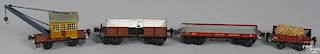 Four Marklin O Gauge freight train cars, painted and lithographed group, to include a derrick car