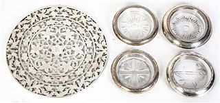 A Group of Nine American Silver Mounted Cut Glass Coasters, Various Makers, 20th Century, with gadrooned or reeded borders, most
