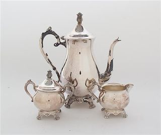 An American Silver-Plate Coffee Set, F.B. Rogers Silver Co., Taunton, MA, comprising a coffee pot, creamer, and lidded sugar bow