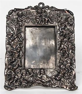 A Victorian Silver-Plate Frame, 11 x 8 3/4 inches.