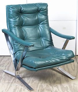 A Chromed Metal and Leather Lounge Chair, Height 38 inches.
