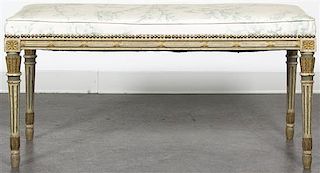 A Louis XVI Style Painted and Parcel Gilt Window Seat, Height 19 1/2 x width 40 x depth 16 inches.