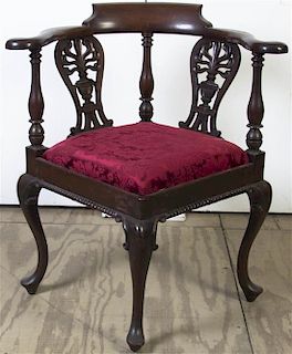 * An English Mahogany Corner Chair, Height 32 1/2 inches.