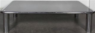 * A Chromed and Mirrored Low Table, Height 14 1/2 x width 62 1/2 x depth 35 1/4 inches.