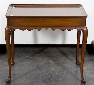 * A Queen Anne Style Mahogany Tea Table, Height 26 1/2 x width 30 x depth 18 1/2 inches.