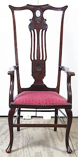 * An Edwardian Style Mahogany Armchair, Height 49 inches.