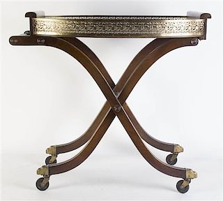 A Mahogany and Pierced Brass Serving Tray, Width of tray 26 inches.