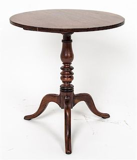 A Georgian Style Diminutive Mahogany Tilt-Top Tea Table, Height 13 1/4 x diameter 12 1/2 inches.