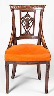 A Neoclassical Fruitwood Open Armchair, Height 35 inches.