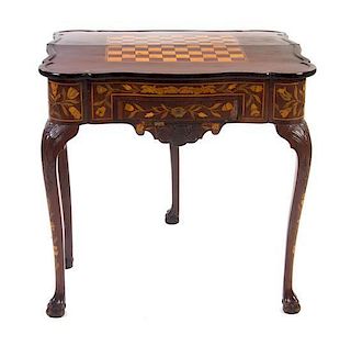 * A Dutch Marquetry Flip-Top Games Table, Height 29 1/4 x width 29 1/2 x depth 14 1/4 inches.