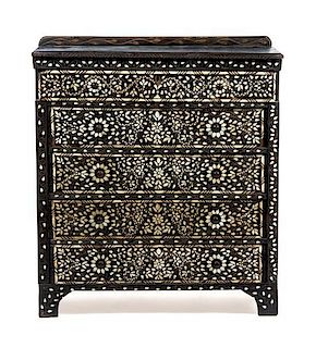 An Anglo-Indian Chest of Drawers. Height 48 x width 44 x depth 20 1/2 inches.