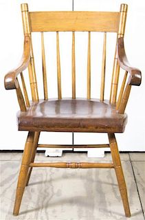 An American Oak Armchair, Height 32 inches.