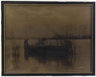 Edward S. Curtis, (American, 1868-1952), Figure in a Canoe
