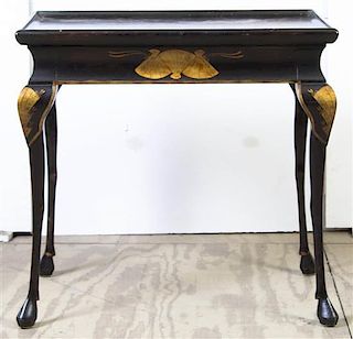 A Japanese Export Style Lacquered Tea Table, Height 26 1/2 x width 28 x depth 20 1/2 inches.