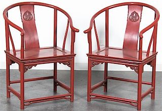 A Pair of Red Lacquer Horseshoe Back Quanyi Chairs. Height 40 inches.