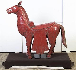 An Antique Horse. Height 37 inches.