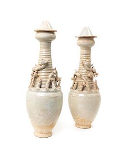 A Pair of Song Funerary Urns, Height of taller overall 16 7/8 inches.