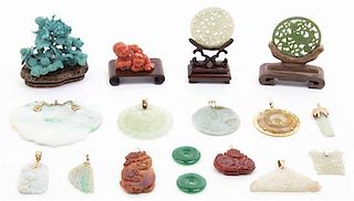 A Collection of Jade and Hardstone Pendants and Toggles, Width of first 2 7/8 inches.