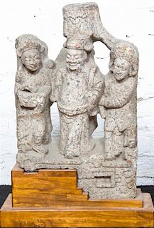 A Chinese Carved Stone Figural Group, Height of stone 21 1/2 inches.