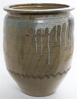 A Japanese Glazed Ceramic Storage Jar, Height 19 1/4 inches.