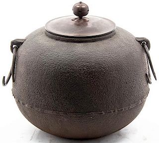 A Japanese Iron Jar, Height 8 inches.