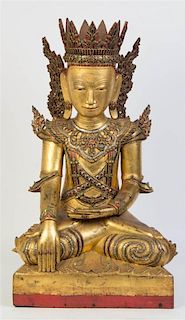 A Southeast Asian Figure of a Seated Buddha, Height 33 inches.