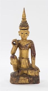 A Southeast Asian Carved Wood Figure, Height 28 1/2 inches.