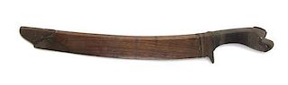 A Southeast Asian Wooden Dagger, Length overall 15 inches.