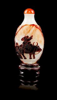 * A Peking Glass Snuff Bottle, Height 2 1/2 inches.