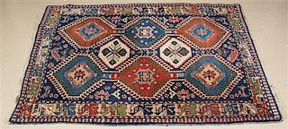 * A Northwest Persian Wool Rug 5 feet x 3 feet 7 inches.