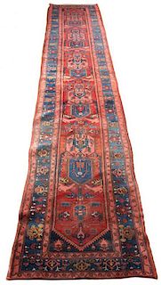 * A Northwest Persian Wool Runner 16 feet 3 inches x 2 feet 11 inches.