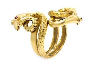An 18 Karat Yellow Gold and Ruby Serpent Ring, 9.70 dwts.