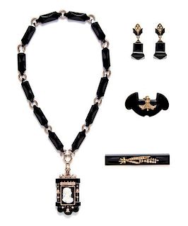 A Collection of Victorian Gold, Onyx, Seed Pearl, Enamel and Cameo Mourning Jewelry, 71.90 dwts.
