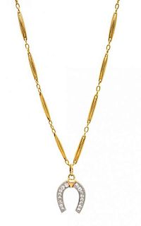 * A Yellow Gold Fob Chain with Platinum Topped Gold and Diamond Horseshoe Pendant, 19.90 dwts.